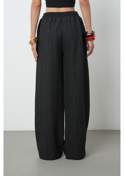 Kadın Simli Bol Paça Beli Lastikli Düz Renk Pantolon indirimleri