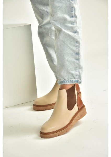 V555115103 Bej Hakiki Deri Kalın Tabanlı Kadın Bot fiyatları