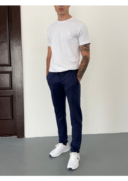 Unisex Beli Bağlamalı Pamuklu Reçmeli Paça Iki Iplik Lacivert Eşofman Altı fiyatları