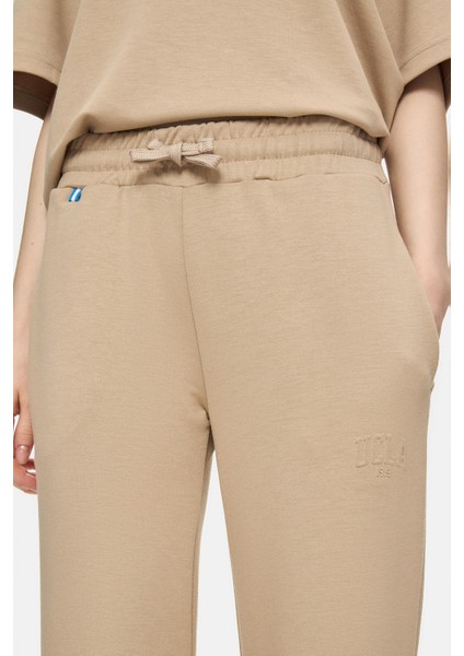 Uranıa Koyu Bej Ispanyol Paça Gofre Baskı Loose Fit Kadın Eşofman Alt fiyatları