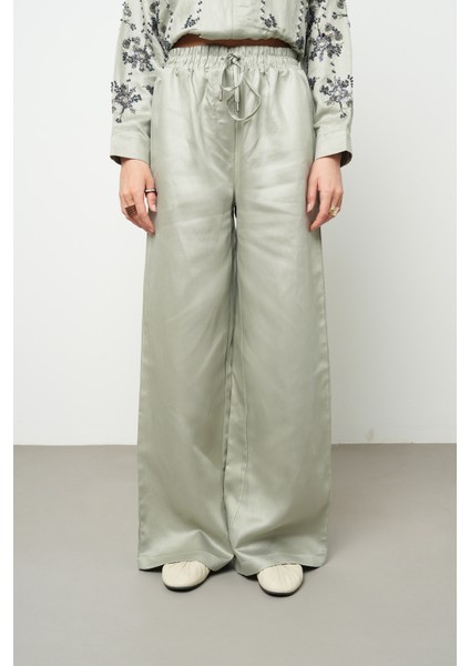 Kadın Bol Paça Beli Lastikli Bağcıklı Düz Renk Pantolon