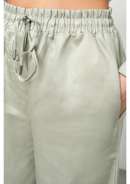 Kadın Bol Paça Beli Lastikli Bağcıklı Düz Renk Pantolon fırsatları