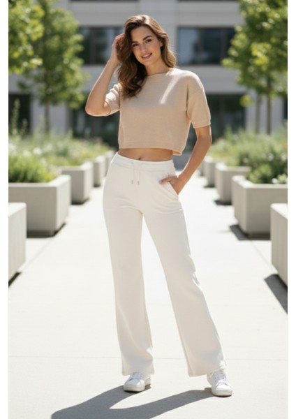Pamuklu Kadın Eşofman Altı Ekru Flare Fit Geniş Paça İpli Cepli Esnek Rahat Kesim Yumuşak Likralı fiyatları
