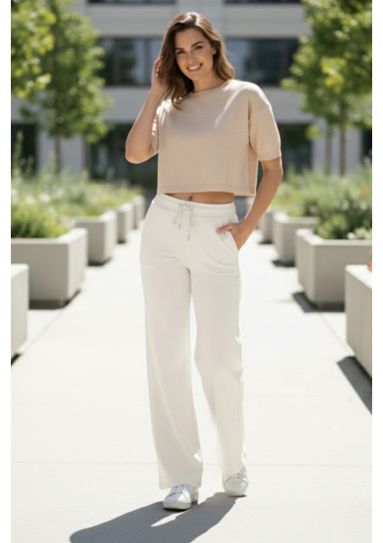 Pamuklu Kadın Eşofman Altı Ekru Flare Fit Geniş Paça İpli Cepli Esnek Rahat Kesim Yumuşak Likralı modelleri
