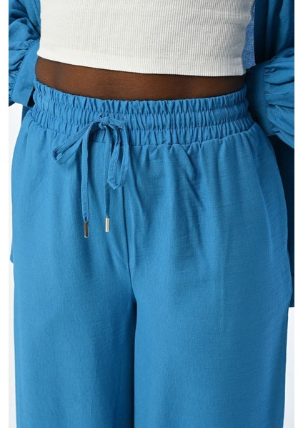 Kadın Rahat Kalıp Bol Paça Beli Lastikli Düz Renk Pantolon modelleri