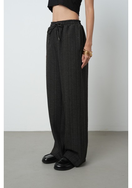 Kadın Simli Bol Paça Beli Lastikli Düz Renk Pantolon fiyatları