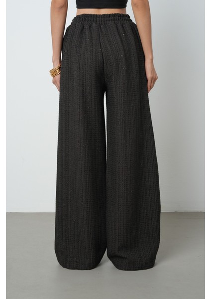 Kadın Simli Bol Paça Beli Lastikli Düz Renk Pantolon indirimleri