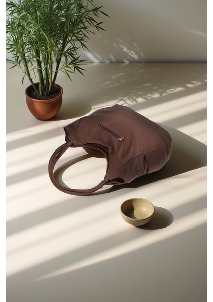 Astarlı Tek Bölmeli Püsküllü El ve Omuz Çantası 111005 fiyatları