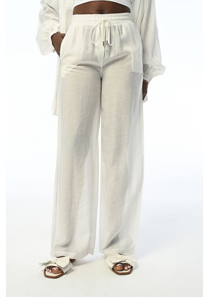 Kadın Rahat Kalıp Bol Paça Beli Lastikli Düz Renk Pantolon