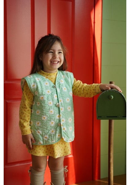 Papatya Desenli Yeşil Peluş Bebek Yeleği indirimleri