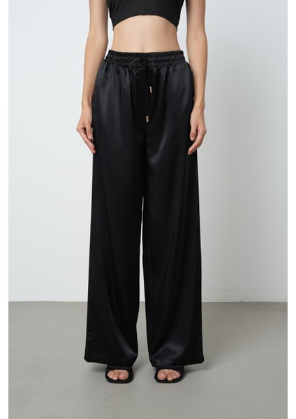 Kadın Siyah Renk Saten Bol Paça Beli Lastikli Pantolon