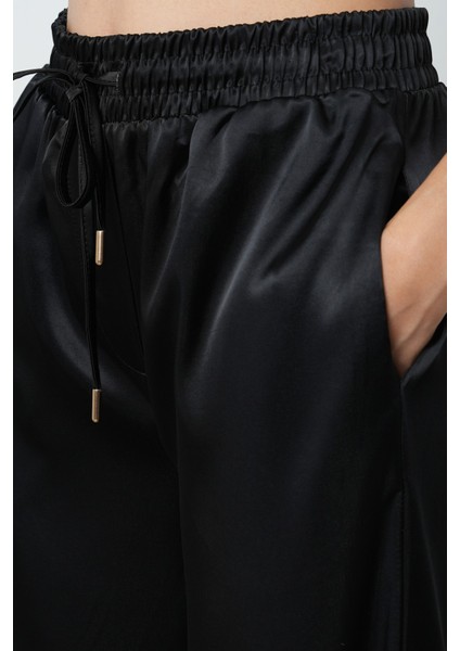 Kadın Siyah Renk Saten Bol Paça Beli Lastikli Pantolon fırsatları