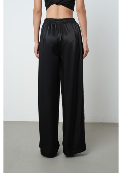 Kadın Siyah Renk Saten Bol Paça Beli Lastikli Pantolon indirimleri