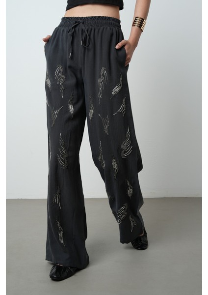 Kadın Önü Taş Işlemeli Düz Renk Beli Lastikli Bol Paça Pantolon modelleri