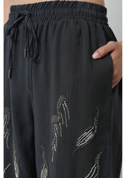 Kadın Önü Taş Işlemeli Düz Renk Beli Lastikli Bol Paça Pantolon fırsatları
