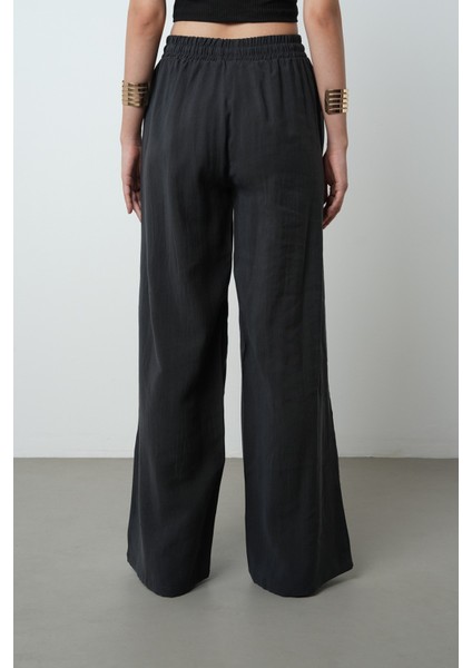 Kadın Önü Taş Işlemeli Düz Renk Beli Lastikli Bol Paça Pantolon indirimleri