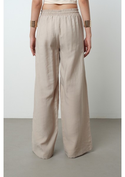 Kadın Önü Taş Işlemeli Düz Renk Beli Lastikli Bol Paça Pantolon indirimleri