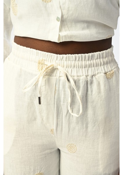 Kadın Bol Paça Beli Lastikli Ekru Renk Desenli Pantolon fiyatları