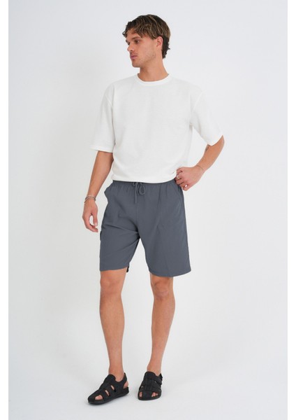 Yazlık Keten Görünümlü Kargo Cep Lastikli, Bol Kesim Toprak Renk Şort 201-31 fiyatları