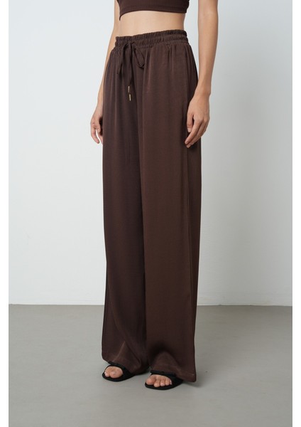 Kadın Düz Renk Altın Rengi Bağcık Detaylı Bol Paça Beli Lastikli Pantolon fiyatları