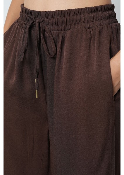 Kadın Düz Renk Altın Rengi Bağcık Detaylı Bol Paça Beli Lastikli Pantolon fırsatları