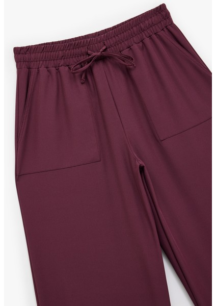 Rahat Kalıp Cepli Beli Bağcıklı Geniş Paça Spor Eşofman Altı modelleri