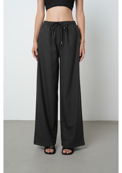 Kadın Düz Renk Kumaş Bol Paça Beli Lastikli Pantolon