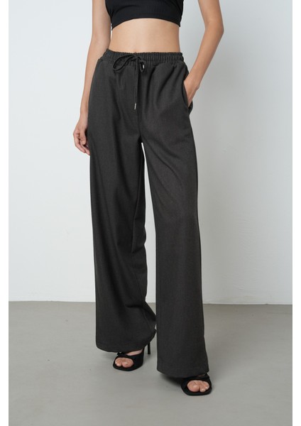 Kadın Düz Renk Kumaş Bol Paça Beli Lastikli Pantolon fiyatları