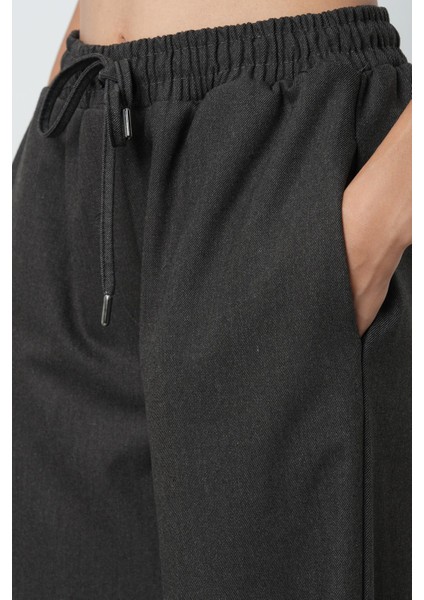 Kadın Düz Renk Kumaş Bol Paça Beli Lastikli Pantolon fırsatları