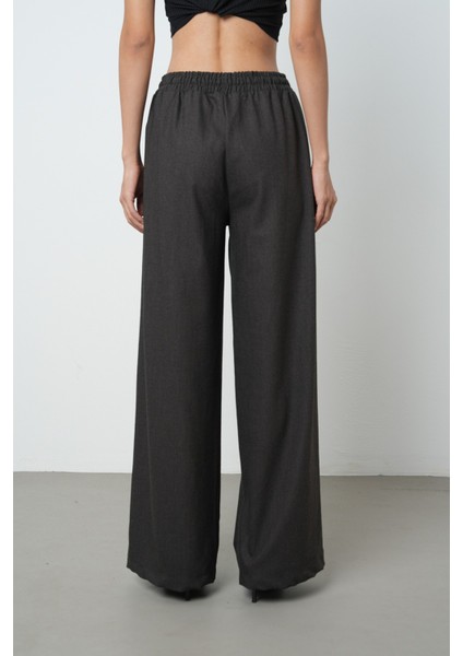 Kadın Düz Renk Kumaş Bol Paça Beli Lastikli Pantolon indirimleri
