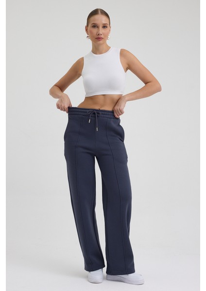 Kadın Yüksek Bel Nervürlü Kışlık Polarlı Paça Dikişli Bol Paça Eşofman Altı Füme indirimleri