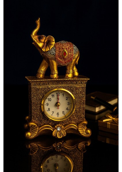 Fil Figürlü Zarif Masa Saati Bolluk Şans Simgesi Kırmızı Taş Detay Altın Renkli Fil Masa Saati 19 cm