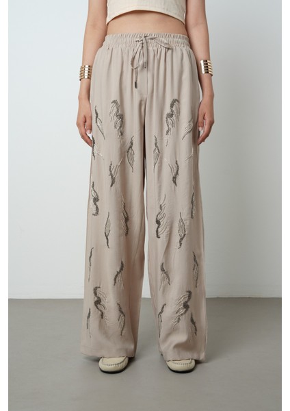 Kadın Önü Taş Işlemeli Düz Renk Beli Lastikli Bol Paça Pantolon