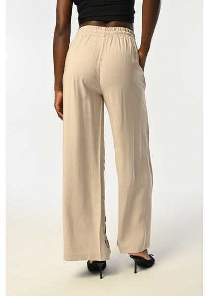 Kadın Beli Lastikli Bol Paça Yaprak Taş Işlemeli Pantolon fiyatları