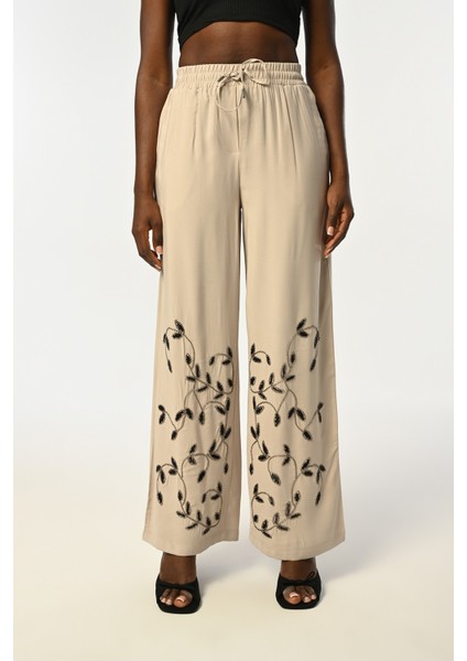 Kadın Beli Lastikli Bol Paça Yaprak Taş Işlemeli Pantolon modelleri