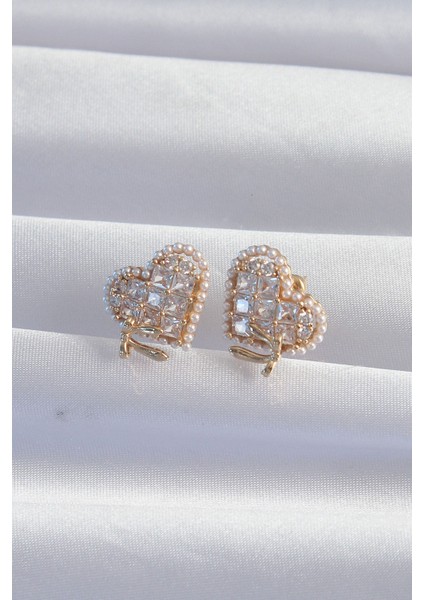 Pirinç Gold Renk Fiyonk Detay Incili Zirkon Taşlı Kalp Küpe fiyatları