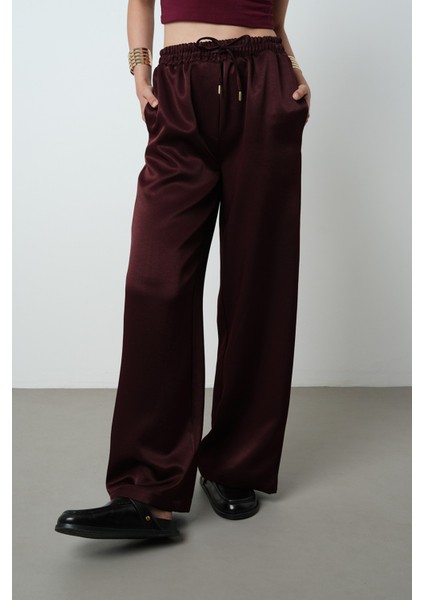 Kadın Düz Renk Parlak Kumaş Bol Paça Beli Lastikli Pantolon modelleri