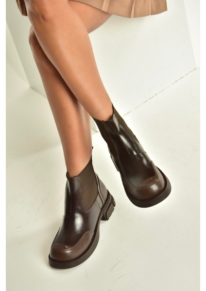 V312402609 Kahverengi Kalın Tabanlı Lastik Detaylı Kadın Bot fırsatları