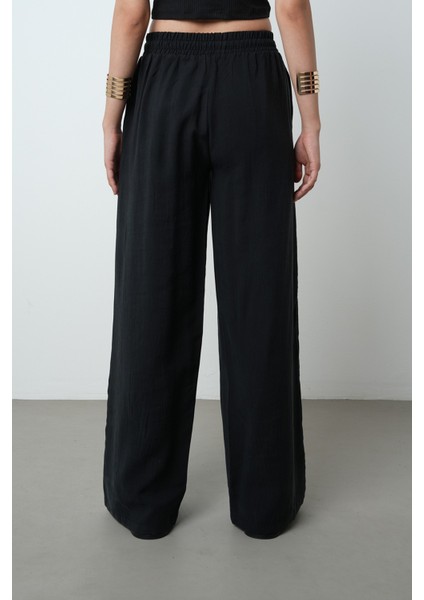 Kadın Yatay Şerit Taş Işlemeli Düz Renk Beli Lastikli Bol Paça Pantolon indirimleri