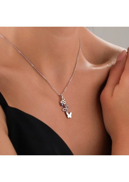 Kadın Kolye – Nazar Boncuklu Zirkon Taşlı Kelebek Figürlü, Kararmaz Antialerjik Gümüş Çelik Tasarım