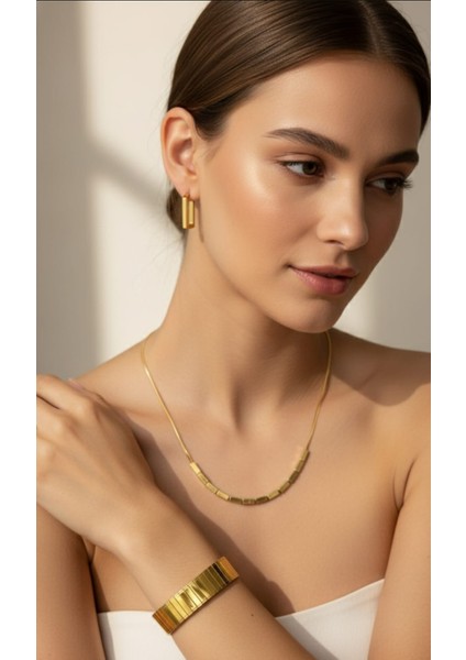 Kadın Gold Rengi Kolye Küpe ve Bileklikten oluşan Çelik Takı Setli| Sns5008111 fiyatları