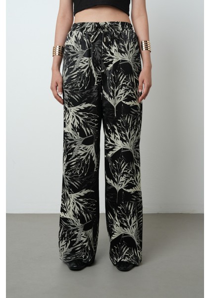 Kadın Siyah Renk Dal Desenli Bol Paça Beli Lastikli Pantolon