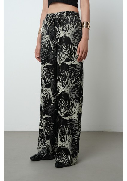 Kadın Siyah Renk Dal Desenli Bol Paça Beli Lastikli Pantolon fiyatları