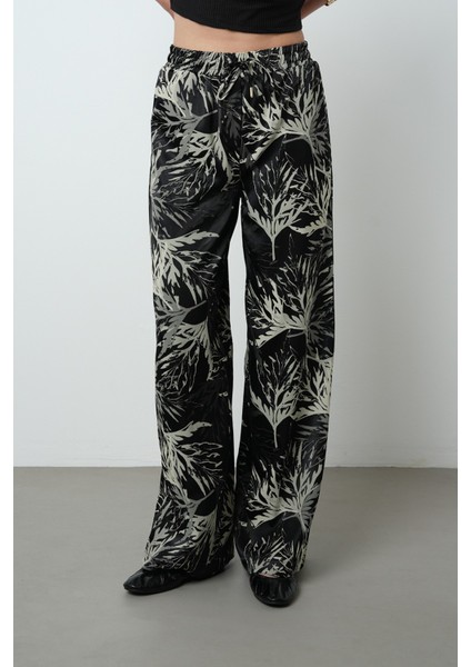 Kadın Siyah Renk Dal Desenli Bol Paça Beli Lastikli Pantolon modelleri