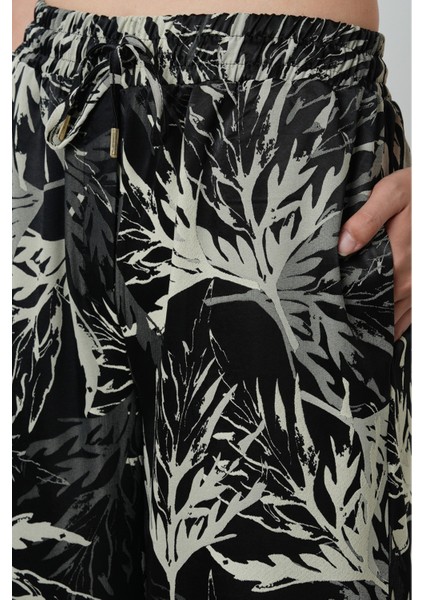 Kadın Siyah Renk Dal Desenli Bol Paça Beli Lastikli Pantolon fırsatları
