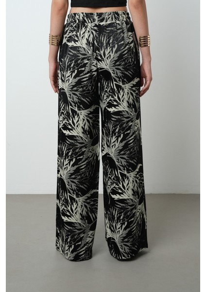Kadın Siyah Renk Dal Desenli Bol Paça Beli Lastikli Pantolon indirimleri