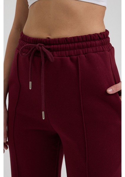 Kadın Yüksek Bel Nervürlü Kışlık Polarlı Paça Dikişli Bol Paça Eşofman Altı Bordo modelleri