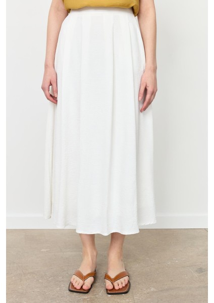 Pileli Uzun Kloş Etek-Kemık fırsatları