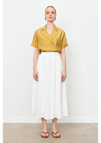 Pileli Uzun Kloş Etek-Kemık indirimleri