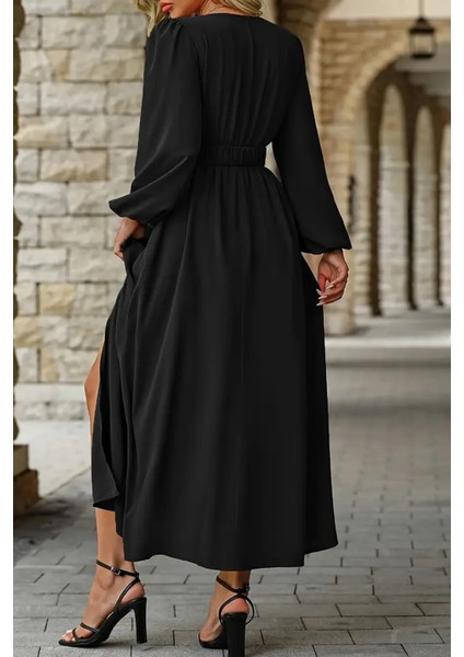 Siyah Kruvaze Yaka Uzun Kollu Maxi Elbise Yırtmaç Detaylı Beli Kemerli Tokalı Abiye indirimleri